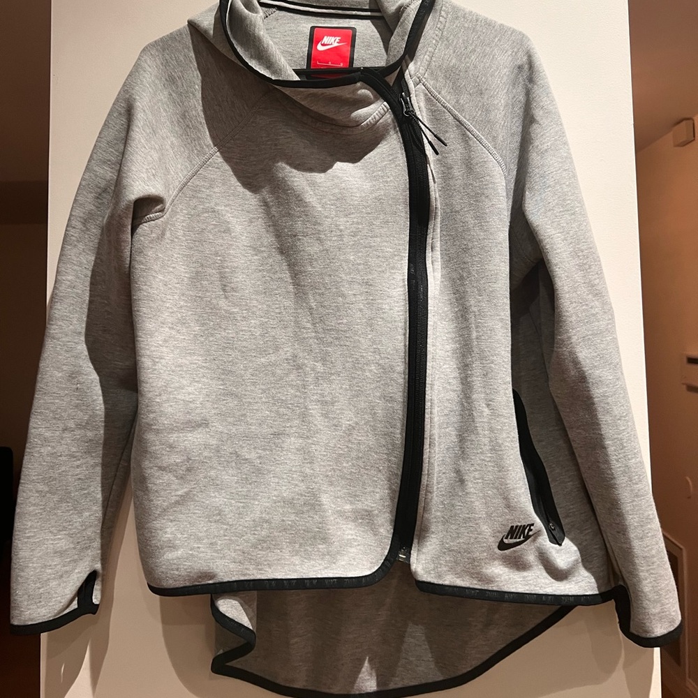 Brand new, Nike zip up, large but can fit medium as well!